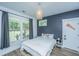 Comfortable bedroom with neutral tones, natural light, and stylish decor creating a relaxing atmosphere at 1375 Tannanger Trl, Awendaw, SC 29429