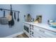 Kitchenette area with microwave, wine storage, stainless steel bar, and decorative countertop accessories at 1375 Tannanger Trl, Awendaw, SC 29429