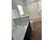 Bright bathroom showcasing a combination tub and shower, vanity with storage, and neutral tile flooring at 1401 Dabbling Duck Dr, Summerville, SC 29483