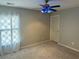 Bedroom with carpet flooring, a window with curtains, and a ceiling fan with blue lighting at 1401 Dabbling Duck Dr, Summerville, SC 29483