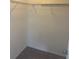 Empty closet with carpeted floor and metal shelf and rod for optimized storage at 1401 Dabbling Duck Dr, Summerville, SC 29483