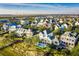 Stunning aerial view of a luxurious community with a private pool and well-manicured landscaping at 1410 Smythe St, Charleston, SC 29492