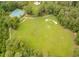 Expansive green space with mature trees, tennis courts, and recreation area at 143 Belleplaine Dr, Goose Creek, SC 29445