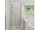 Bathroom featuring a glass-enclosed shower with white tile at 143 Belleplaine Dr, Goose Creek, SC 29445