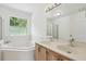 Bathroom features dual sinks, a tub, and shower at 143 Belleplaine Dr, Goose Creek, SC 29445