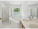Bathroom featuring shower, tub and double sinks at 143 Belleplaine Dr, Goose Creek, SC 29445