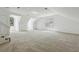 Bright bonus room with plush carpet, dormer windows, and neutral walls at 143 Belleplaine Dr, Goose Creek, SC 29445