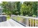 A spacious wood deck offers outdoor entertaining with a view of the backyard, a perfect outdoor spot at 143 Belleplaine Dr, Goose Creek, SC 29445
