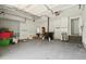 Spacious garage with painted floor and ample storage space at 143 Belleplaine Dr, Goose Creek, SC 29445