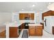 Kitchen featuring wood cabinetry, an island, and modern appliances at 143 Belleplaine Dr, Goose Creek, SC 29445