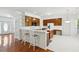 Bright kitchen featuring hardwood floors, island and breakfast bar at 143 Belleplaine Dr, Goose Creek, SC 29445