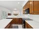 Bright kitchen with an island, bar seating and dining area at 143 Belleplaine Dr, Goose Creek, SC 29445