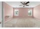 Bedroom with carpet, ceiling fan and two windows that provide natural light at 1533 Bluewater Way, Charleston, SC 29414