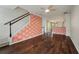 Open concept area that flows from living room to eat-in kitchen area with a staircase at 1533 Bluewater Way, Charleston, SC 29414