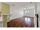 Spacious living room with hardwood floors, a ceiling fan, and access to a patio at 1533 Bluewater Way, Charleston, SC 29414