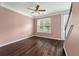 Inviting living room featuring hardwood floors, ceiling fan, natural light, and great space at 1533 Bluewater Way, Charleston, SC 29414