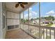 Relaxing screened porch offering neighborhood views and ample natural light at 1533 Bluewater Way, Charleston, SC 29414