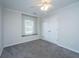 Bright bedroom with double door closet, ceiling fan and natural light at 1582 Ocean Neighbors Blvd, Charleston, SC 29412