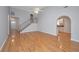 Bright and airy living room features vaulted ceiling, hardwood floors, and open floor plan at 1582 Ocean Neighbors Blvd, Charleston, SC 29412