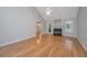 Bright and airy living room with fireplace, hardwood floors, and large windows at 1582 Ocean Neighbors Blvd, Charleston, SC 29412