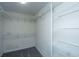 Walk-in closet with white wire shelving offering ample storage space at 1582 Ocean Neighbors Blvd, Charleston, SC 29412