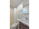Bathroom featuring a shower, toilet, and sink with wood cabinets at 206 Jimbo Rd, Summerville, SC 29485