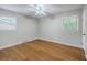 Empty bedroom with hardwood floors, a ceiling fan, and lots of natural light at 206 Jimbo Rd, Summerville, SC 29485