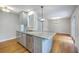 Open kitchen featuring a granite countertop island with stainless steel appliances at 206 Jimbo Rd, Summerville, SC 29485