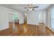 Bright and airy living room with hardwood floors, ceiling fan, and ample natural light at 206 Jimbo Rd, Summerville, SC 29485