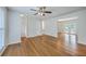 Inviting living room with hardwood floors, ceiling fan, and French doors leading to another room at 206 Jimbo Rd, Summerville, SC 29485