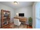 Cozy home office with hardwood floors, natural light, and a well-appointed desk and shelving unit at 206 Jimbo Rd, Summerville, SC 29485