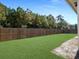 Large backyard featuring a manicured lawn and a wood fence for privacy at 209 Celestial Blvd, Summerville, SC 29486