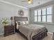 Cozy bedroom featuring neutral walls, comfortable bed, and large window with white shutters at 209 Celestial Blvd, Summerville, SC 29486
