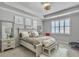 Comfortable bedroom featuring large window, ceiling fan, and neutral-toned decor at 209 Celestial Blvd, Summerville, SC 29486