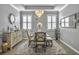 Bright dining room featuring a modern chandelier, hardwood floors, and natural light at 209 Celestial Blvd, Summerville, SC 29486