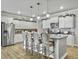 Modern kitchen with stainless steel appliances, granite countertops, and eat-in island at 209 Celestial Blvd, Summerville, SC 29486