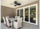 Covered patio with a dining table and chairs, perfect for outdoor entertaining at 209 Celestial Blvd, Summerville, SC 29486