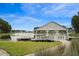 Picturesque boat dock overlooking a serene lake, offering residents a private amenity for leisure and recreation at 246 Calm Water Way, Summerville, SC 29486