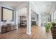 View of open floor plan featuring entry, dining room, and hallway at 246 Calm Water Way, Summerville, SC 29486