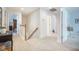 Bright hallway with neutral carpet, white walls and trim and access to other rooms at 246 Calm Water Way, Summerville, SC 29486