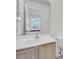 Bathroom vanity with large mirror and view of window at 302 Elm Hall Cir, Summerville, SC 29483