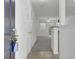 Bright entryway with tile floor leading to carpeted living area, showcasing open concept at 302 Elm Hall Cir, Summerville, SC 29483