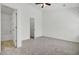 A spacious main bedroom with neutral carpet and an ensuite bathroom at 302 Elm Hall Cir, Summerville, SC 29483