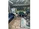 Relaxing backyard deck with dining and lounge area, overlooking a sparkling pool at 3113 Edenvale Rd, Johns Island, SC 29455