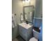 Well-lit bathroom featuring a modern vanity with ample storage and stylish mirror at 3113 Edenvale Rd, Johns Island, SC 29455