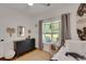 Bright bedroom with natural light, dresser, coastal decor, and daybed at 3113 Edenvale Rd, Johns Island, SC 29455