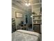 Cozy living area featuring a dining table, mini fridge, and a comfortable bed at 3113 Edenvale Rd, Johns Island, SC 29455