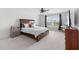 Spacious bedroom featuring a bed, carpet, and large window, creating a comfortable and inviting retreat at 320 Blue Shadows Ct, Summerville, SC 29486