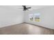 Bright bedroom with large windows and wood look floors provides natural light and a modern touch at 320 Blue Shadows Ct, Summerville, SC 29486