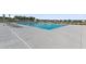 Large community pool with lounge chairs and umbrellas, providing a resort-like experience at 320 Blue Shadows Ct, Summerville, SC 29486